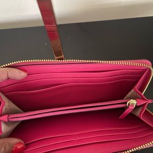 Michael Kors Leather zip around wallet.